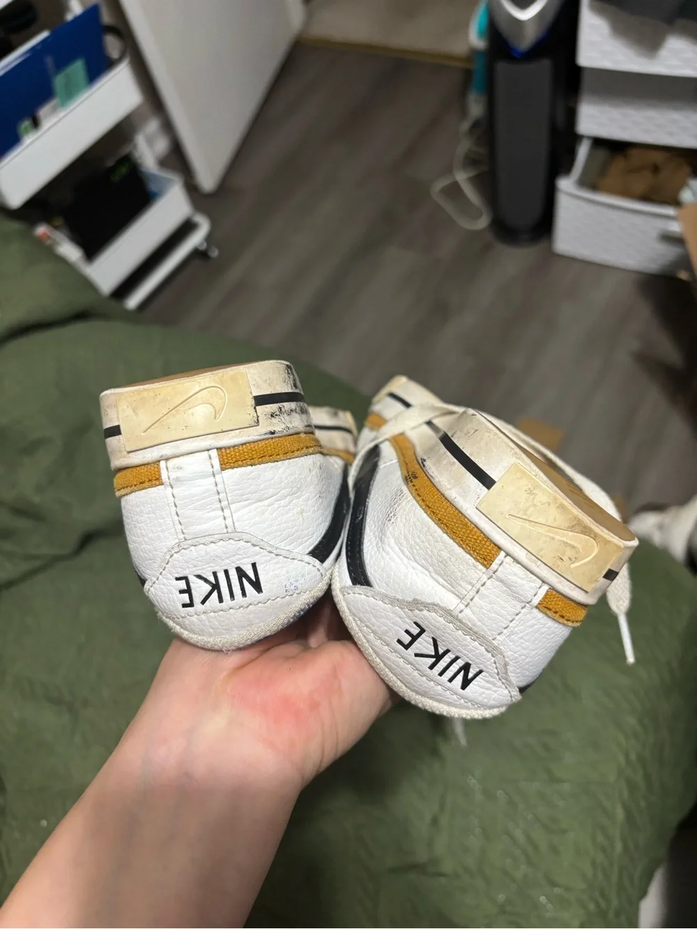 Nike White Leather Sneakers with Black Swoosh and Yellow Accent